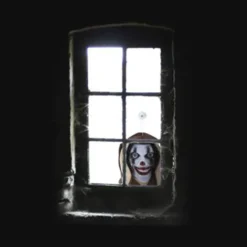 Fönstertittare Läskig Clown