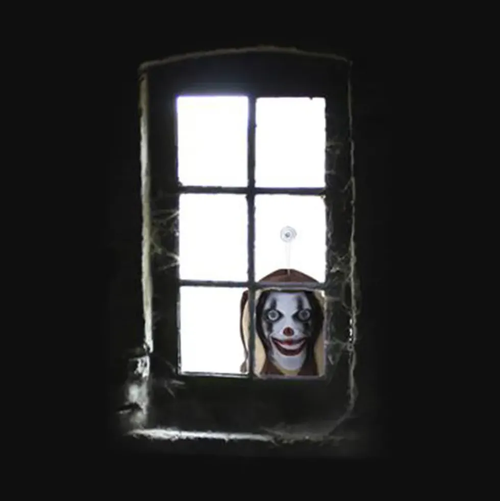 Fönstertittare Läskig Clown