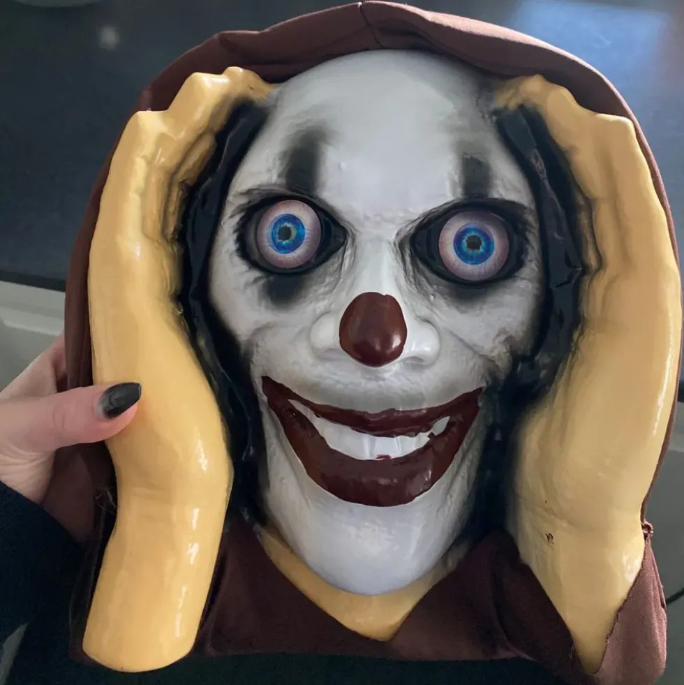 Fönstertittare Läskig Clown